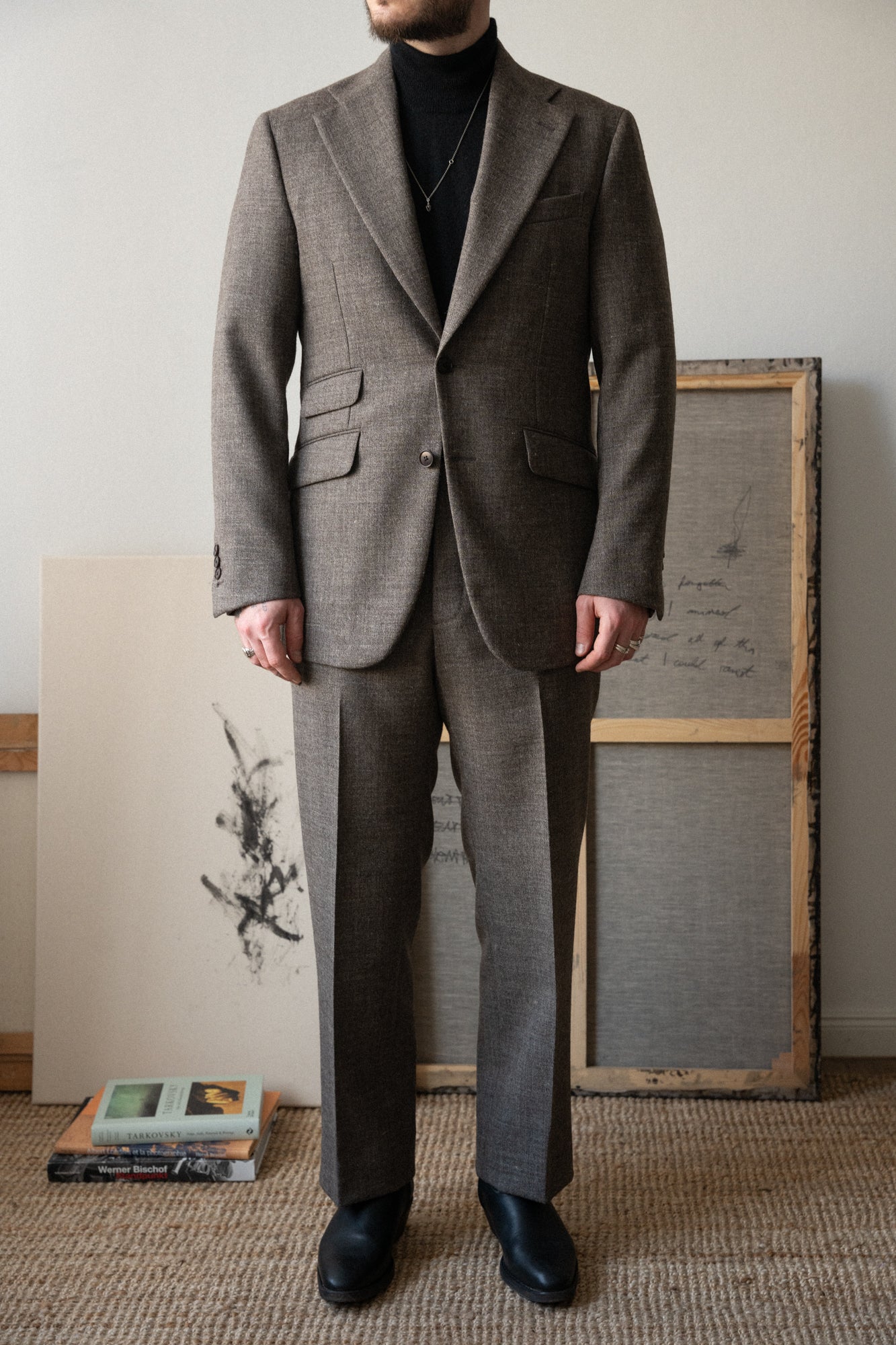 c. undyed british wool suit