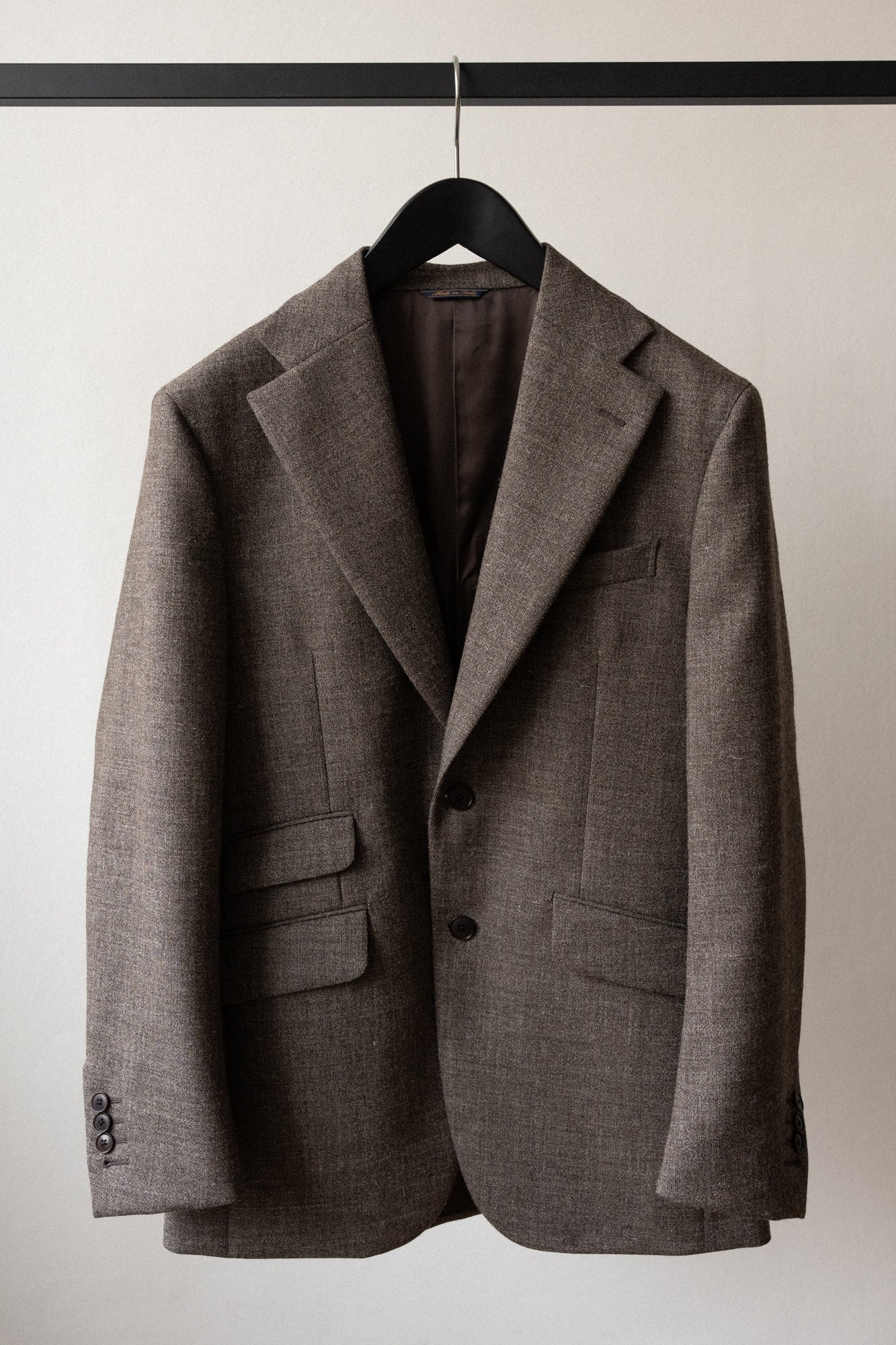 a. undyed british wool suit