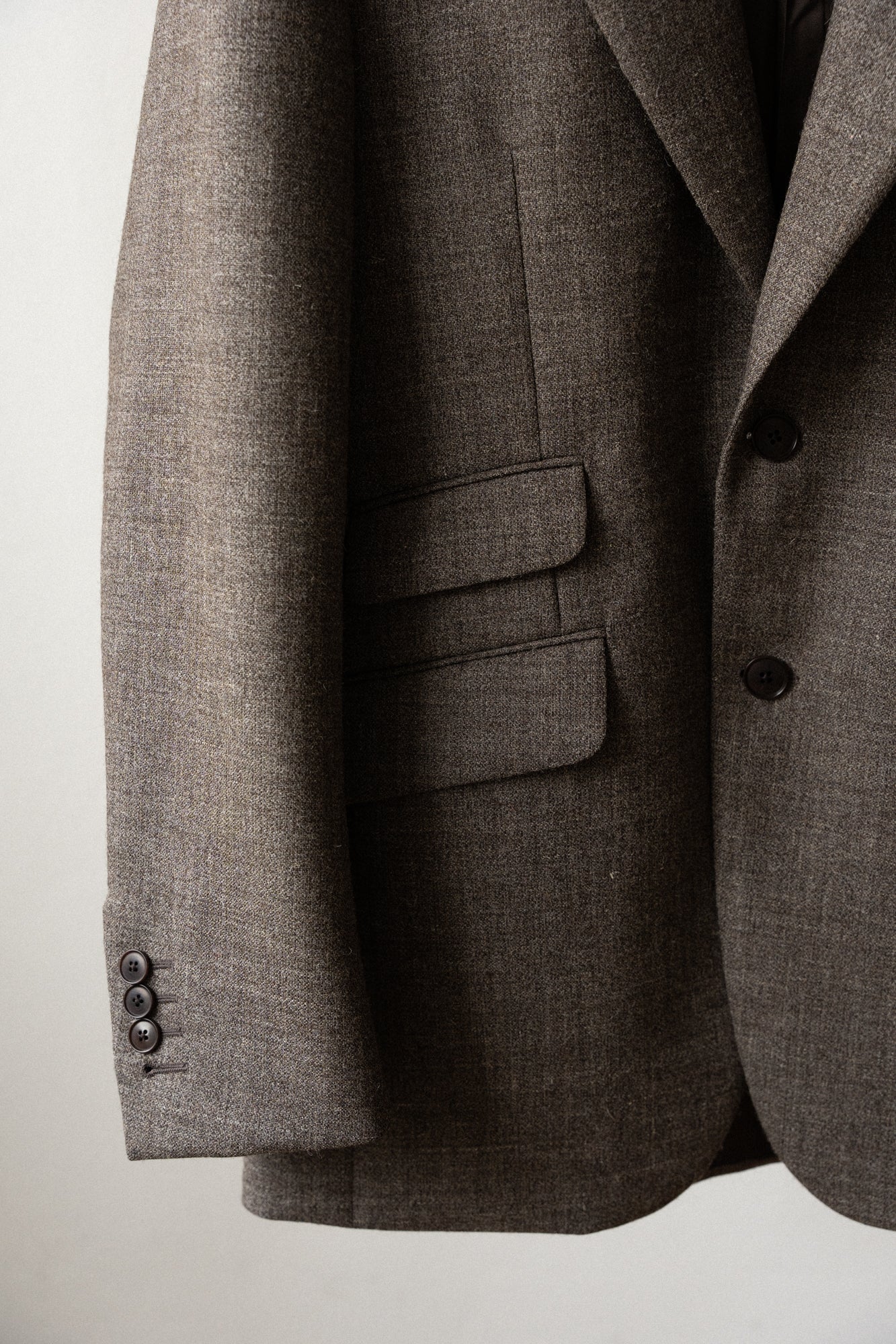 a. undyed british wool suit